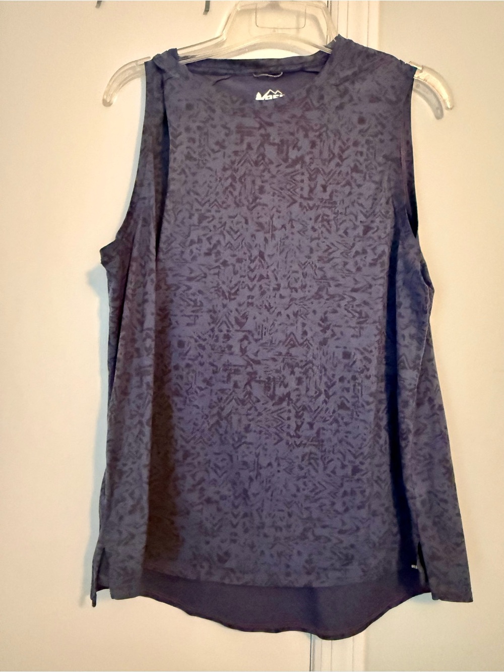 TWO REI sleeveless T-shirts. One blue the other brown. Size large.